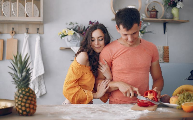 couple cooking together